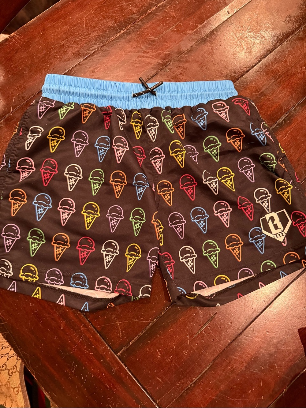 Kids Black Ice Cream Print Swim Shorts with Blue Waistband